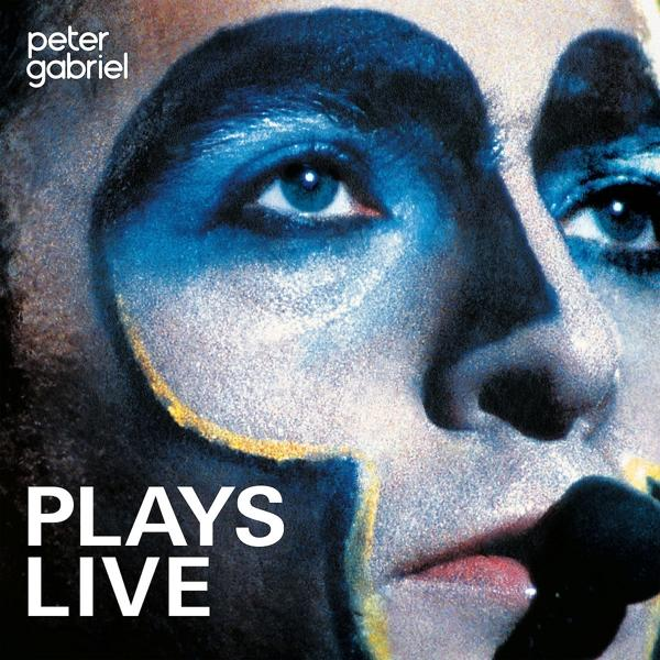 Peter Gabriel, bemaltes Gesicht, auf einem Live-Album-Cover, mit dem Titel.