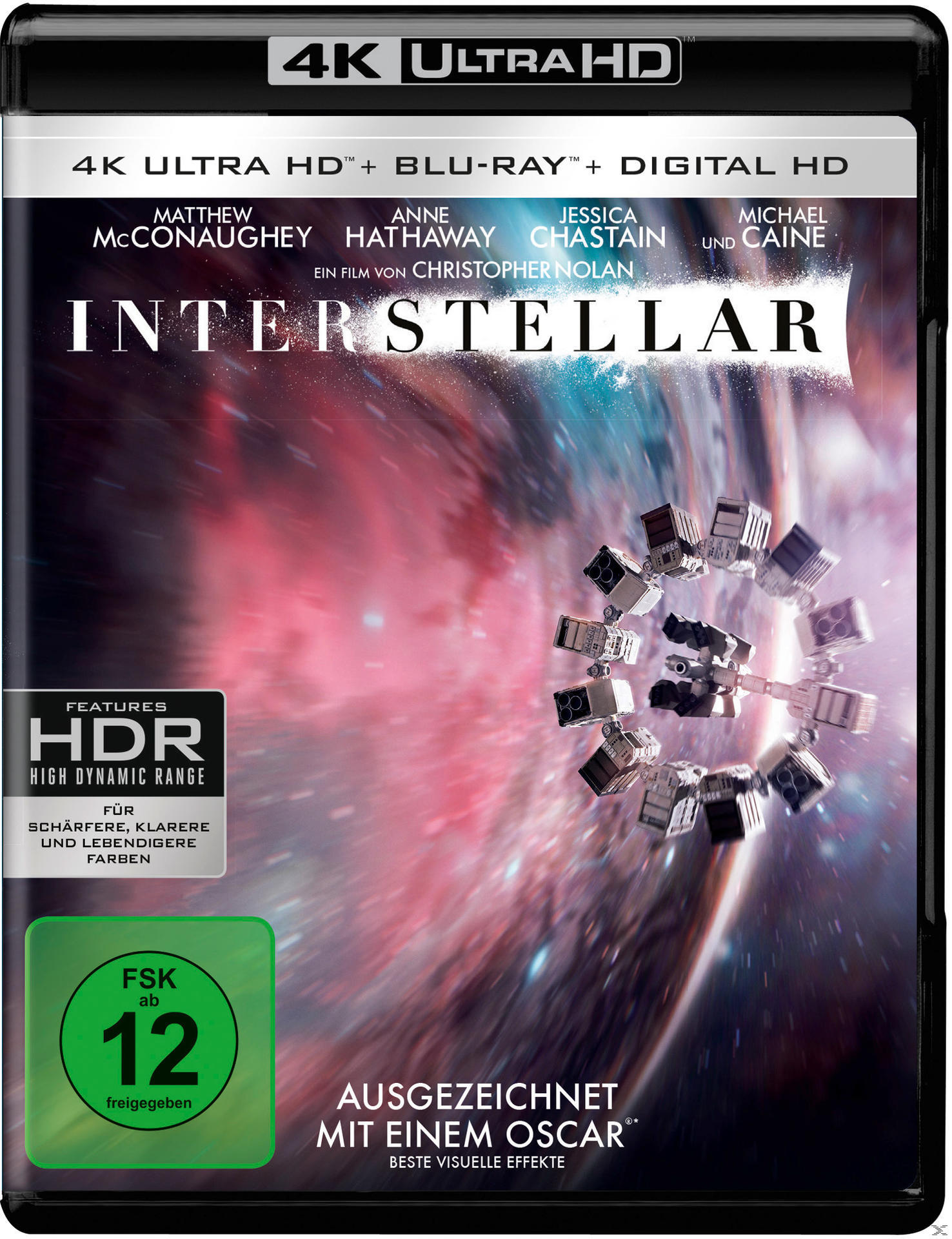 Blu-ray-Cover von 'Interstellar' mit Schauspielernamen und einem Raumschiff in der Nähe einer Galaxie.