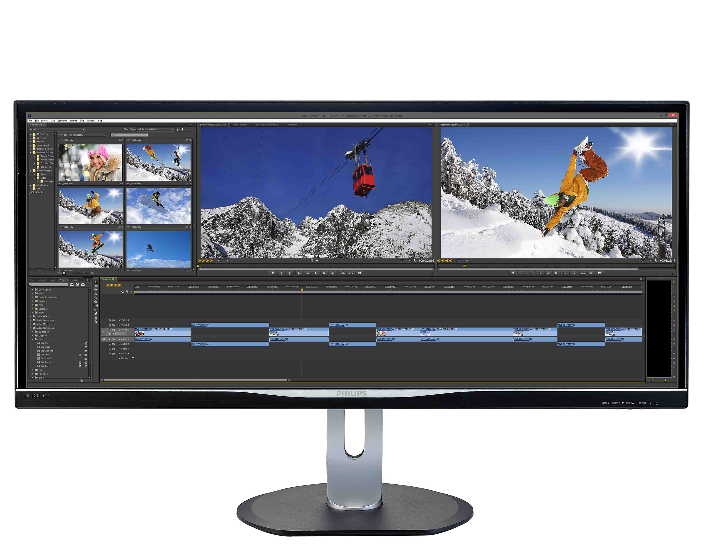 Video düzenleme yazılımı ve çoklu video klipleri gösteren ultra geniş bilgisayar monitörü.