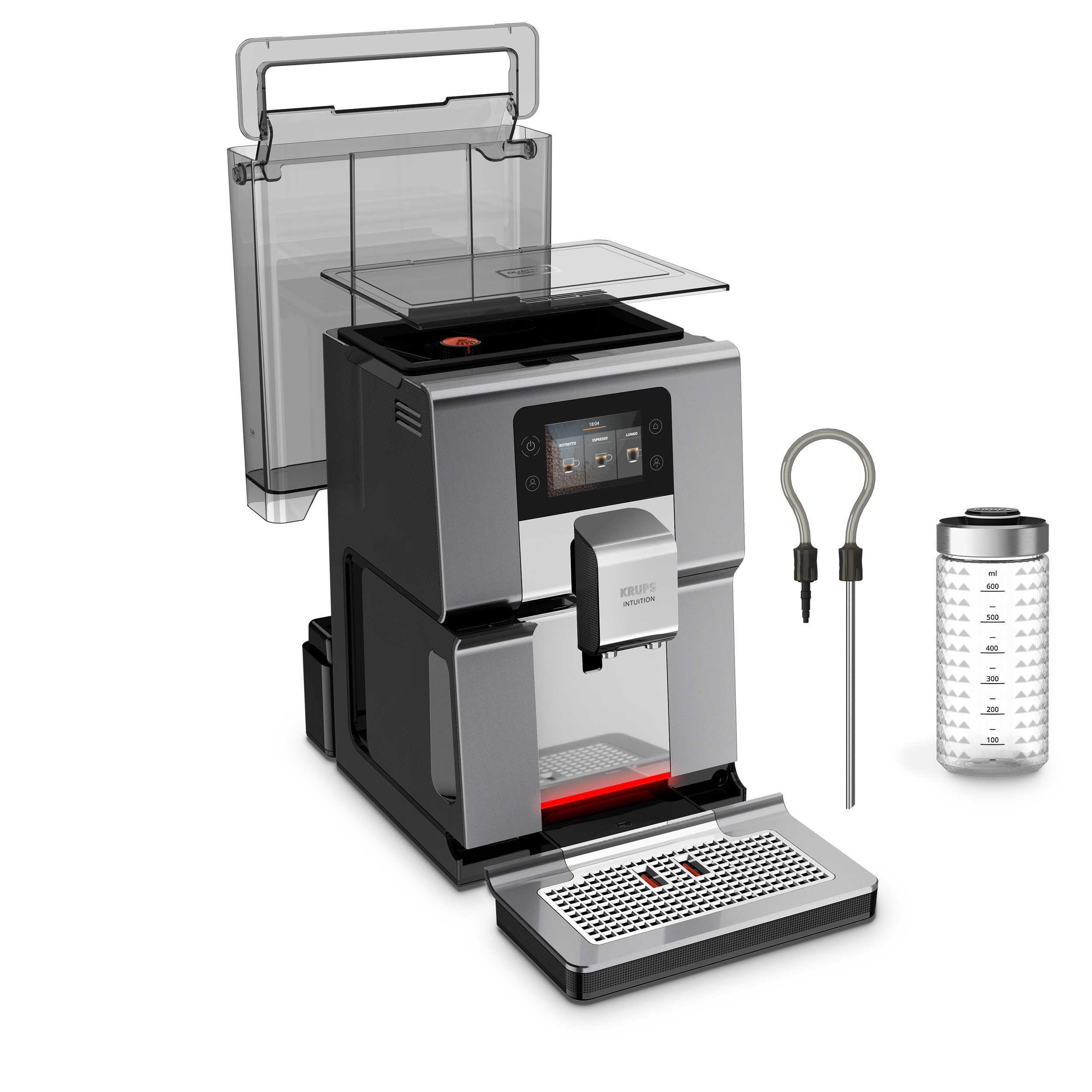 Eine silberne und schwarze Krups Kaffeemaschine mit verschiedenen Komponenten. Auf weißem Grund.