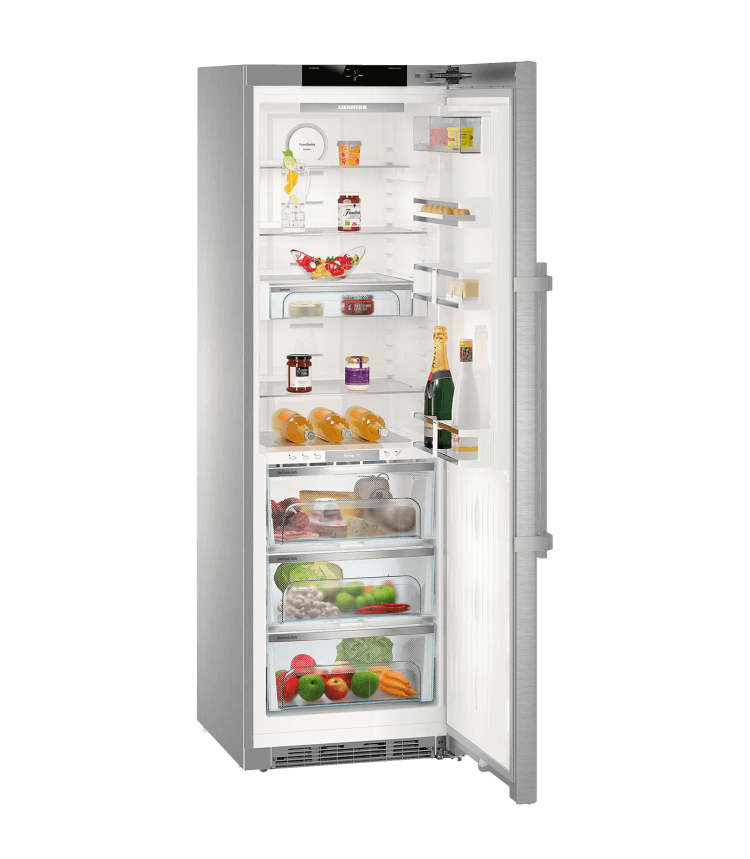 A stainless steel refrigerator, open to show shelves and contents like food and drinks.