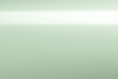 Ein hellgrüner Hintergrund. Die Farbe ist glatt und gleichmäßig verteilt.