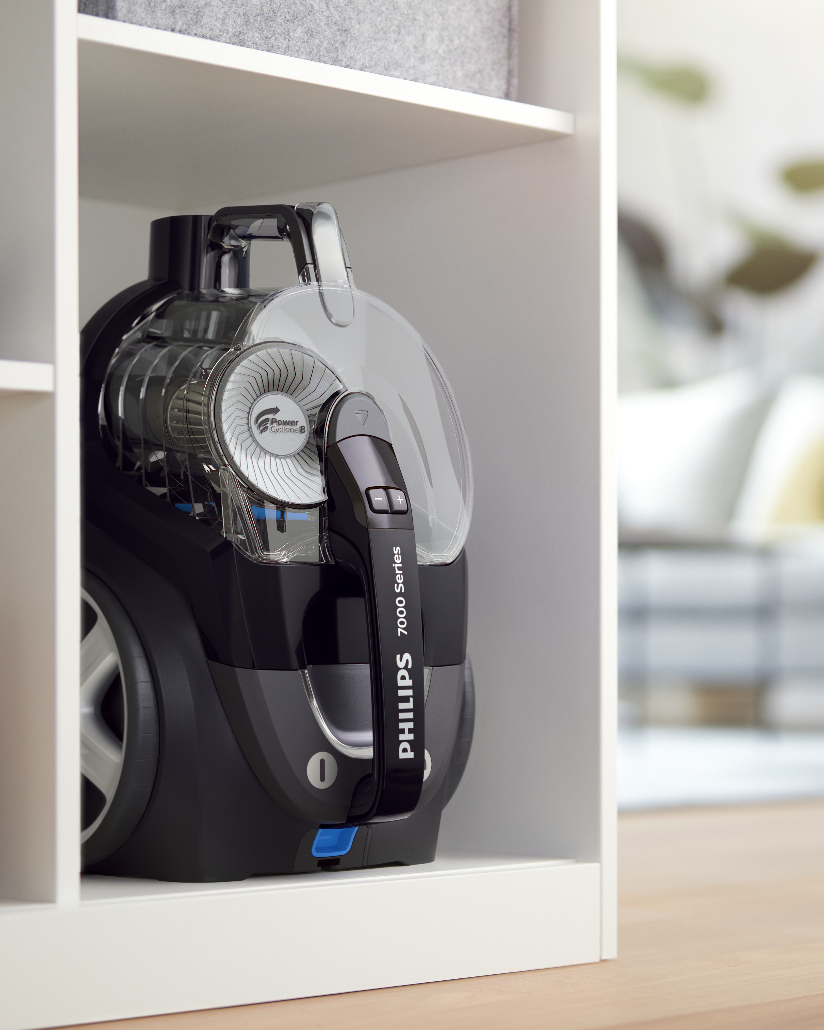 Philips 7000 Serie Staubsauger, gelagert in einem weißen Schrank. Schwarz und klar.