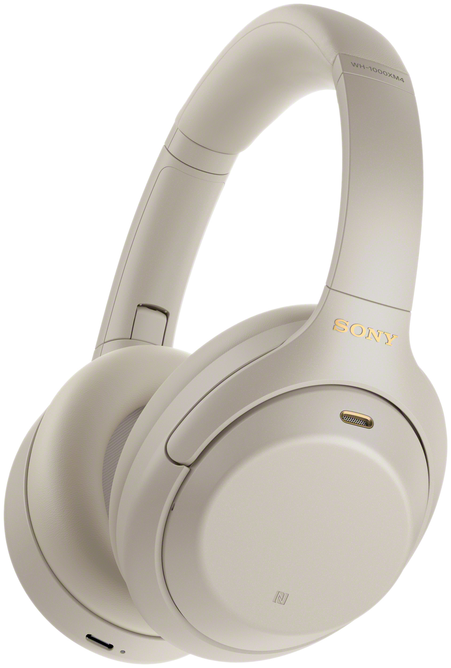 Cremefarbene Sony WH-1000XM4 Kopfhörer. Ohrmuscheln und Kopfband sind sichtbar, mit goldenen Akzenten.