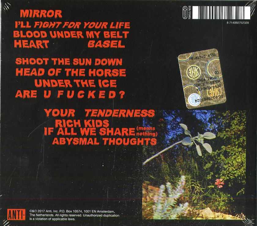 CD-Cover mit grüner Pflanze, schwarzer Text mit Songtiteln auf gelbem Hintergrund.