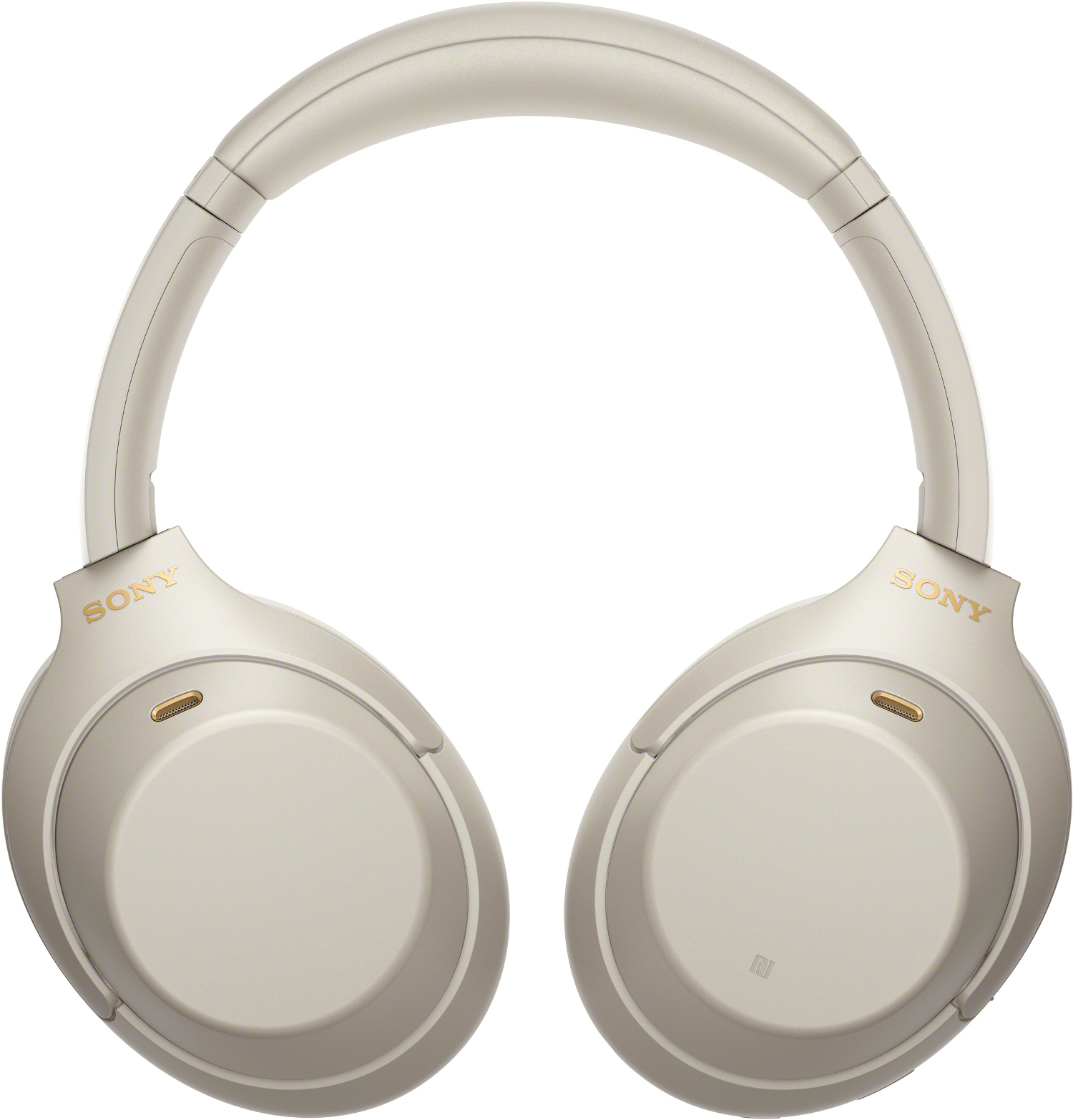 Casque Sony beige. Écouteurs et bandeau beiges. 'SONY' en or sur chaque écouteur. Le fond est blanc.