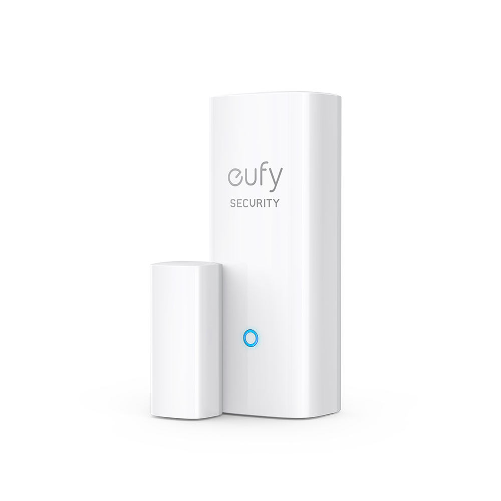 White security device with a smaller component. White background.