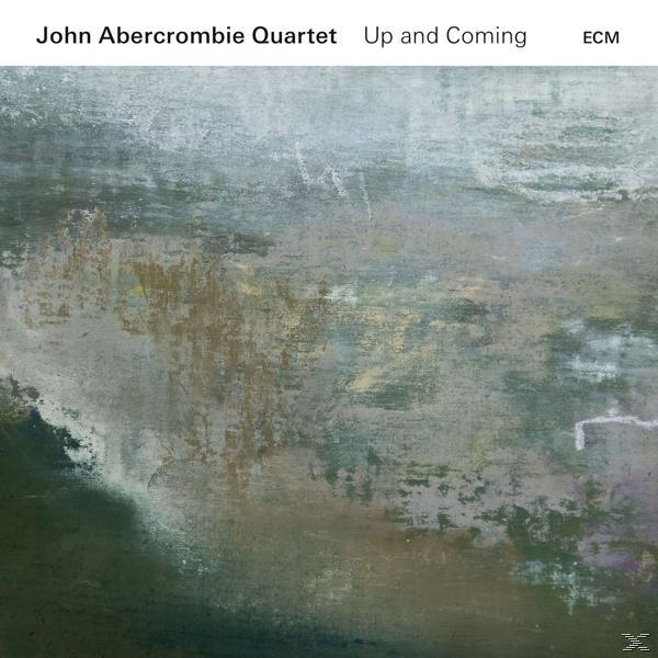 Albumcover mit Text: John Abercrombie Quartet, Up and Coming und einem abstrakten, gemäldeartigen Hintergrund.