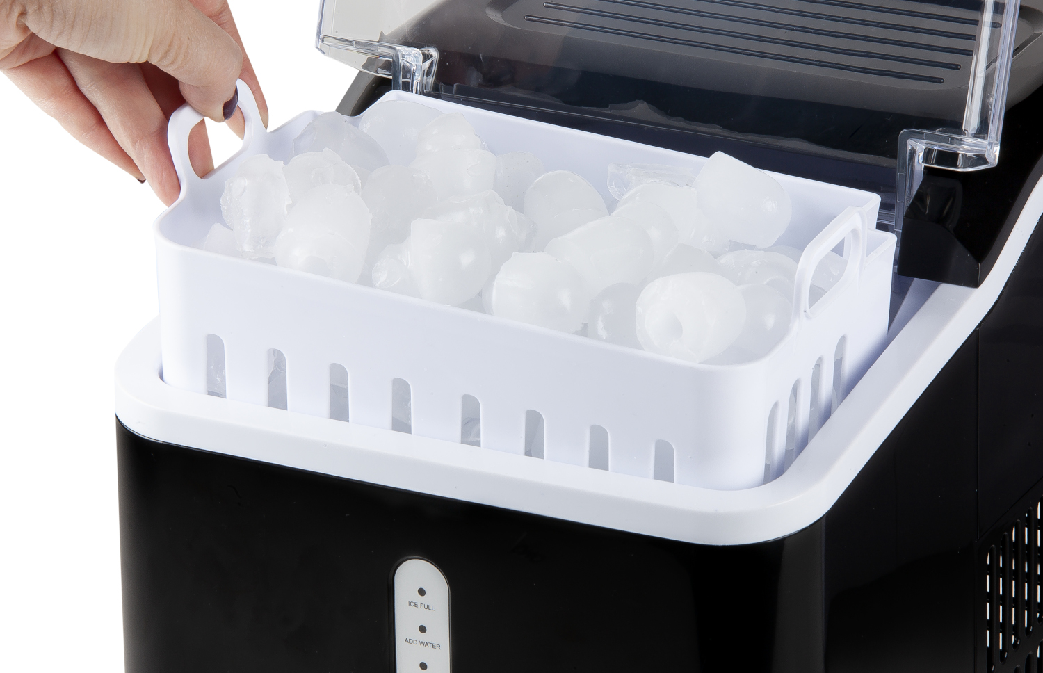 An ice maker with a white tray filled with ice cubes. A hand is removing the tray.