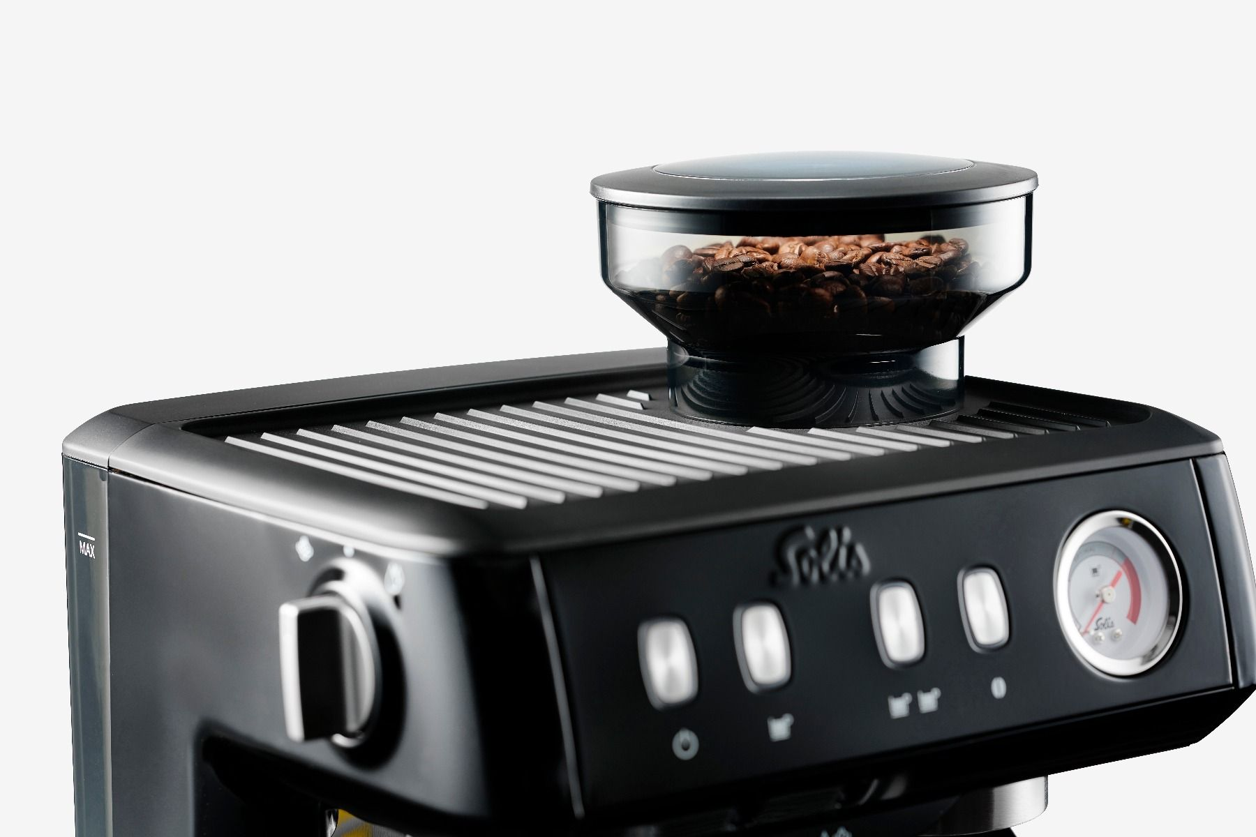 A black coffee machine with a coffee bean container on top.
