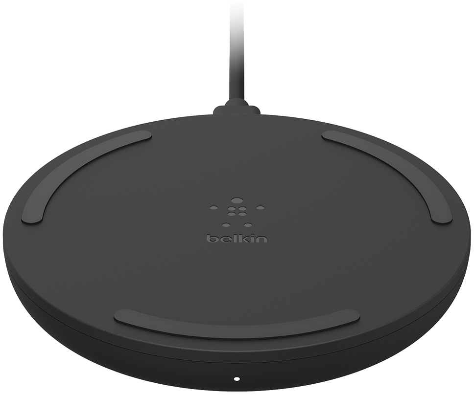 Black, circular Belkin wireless charging pad with three rubber grips and a Belkin logo.