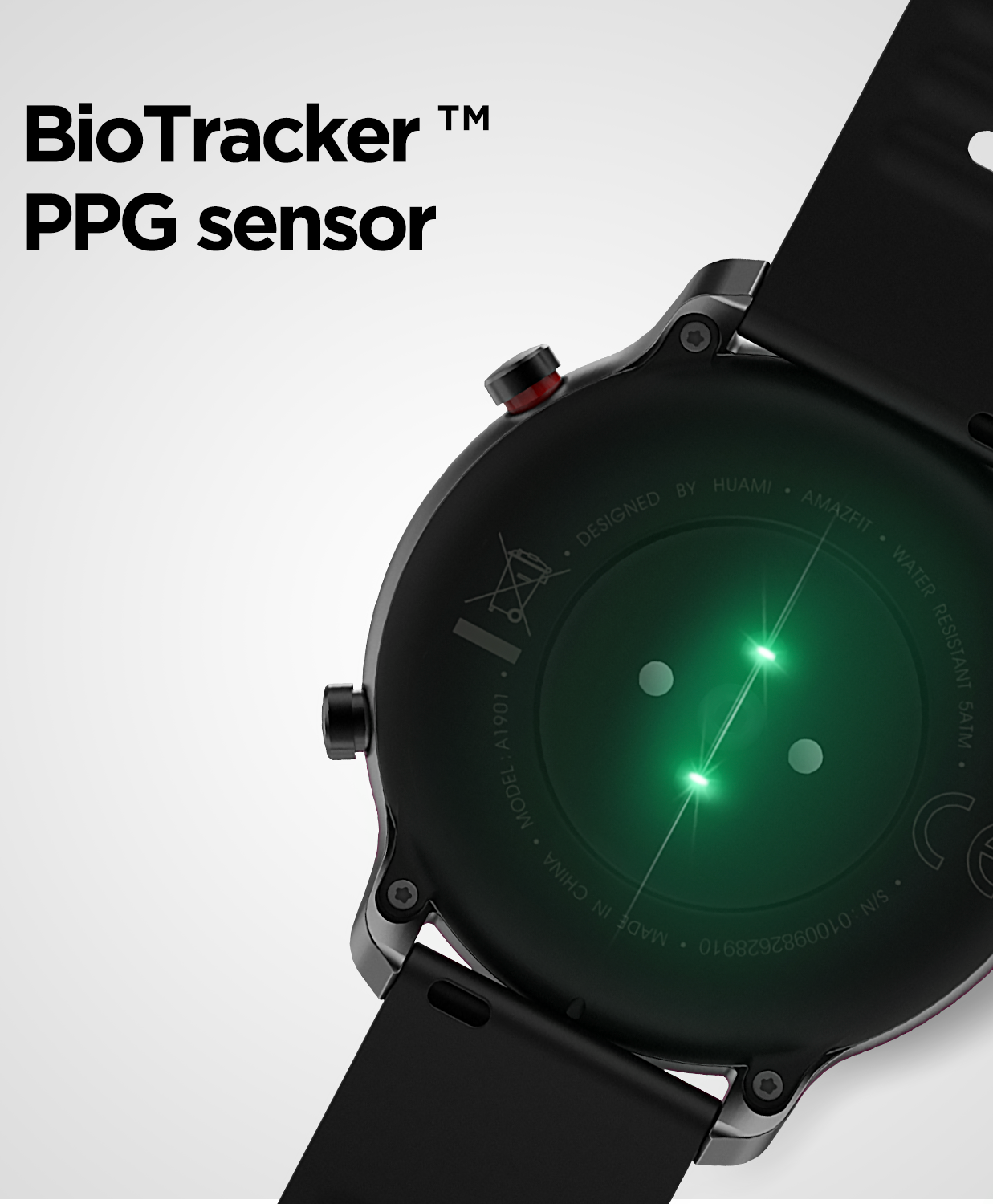 Primer plano de la parte trasera del smartwatch con sensores de luz verde. Correa y cuerpo del reloj negros. Texto: Sensor BioTracker PPG.