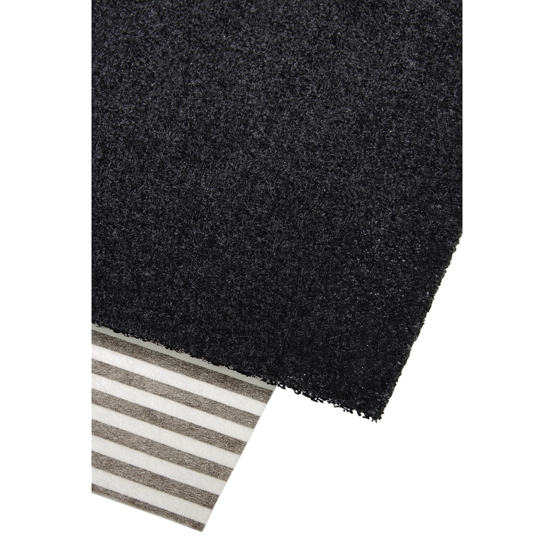 Black, textured fabric over striped fabric, against white background.