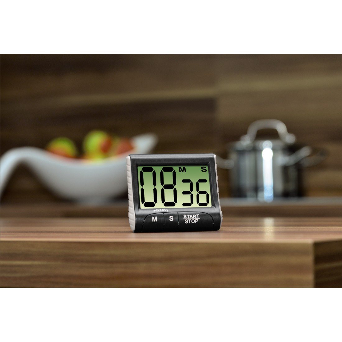 A digital kitchen timer with a black and silver case.