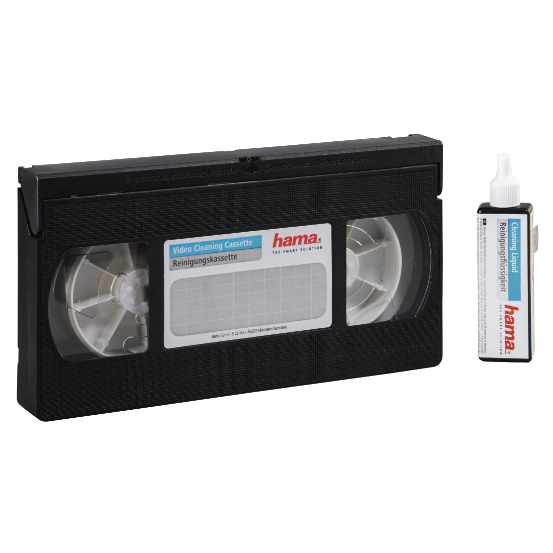 A black VHS video cassette with a cleaning fluid bottle.