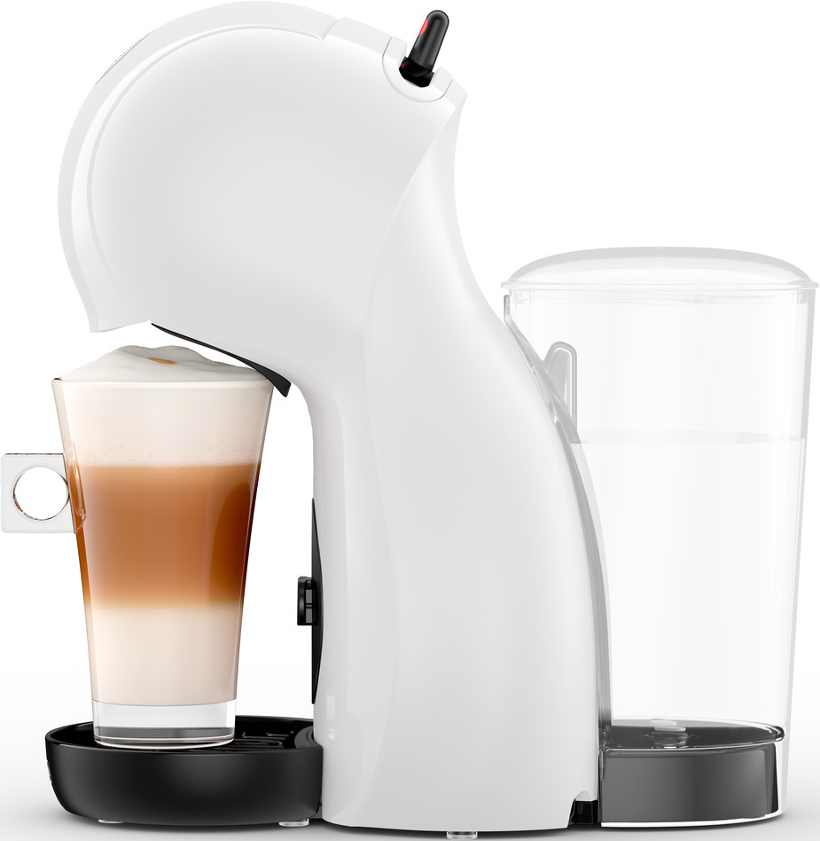 Una macchina da caffè bianca con un bicchiere di latte.
