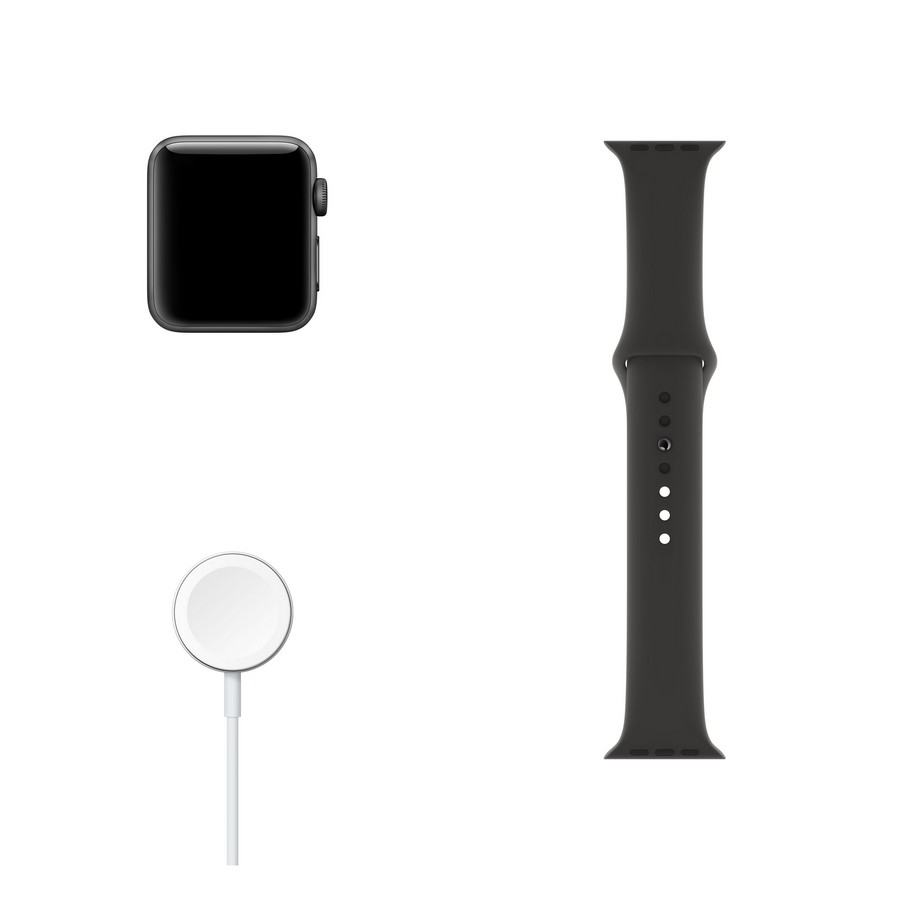 Apple Watch negra con cargador y correa.