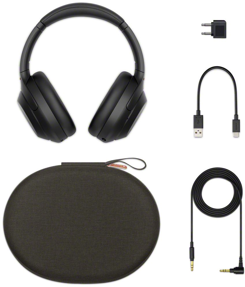 Zwarte koptelefoon, hoes en kabels op wit. Items bevatten een stekker en USB-C kabel.