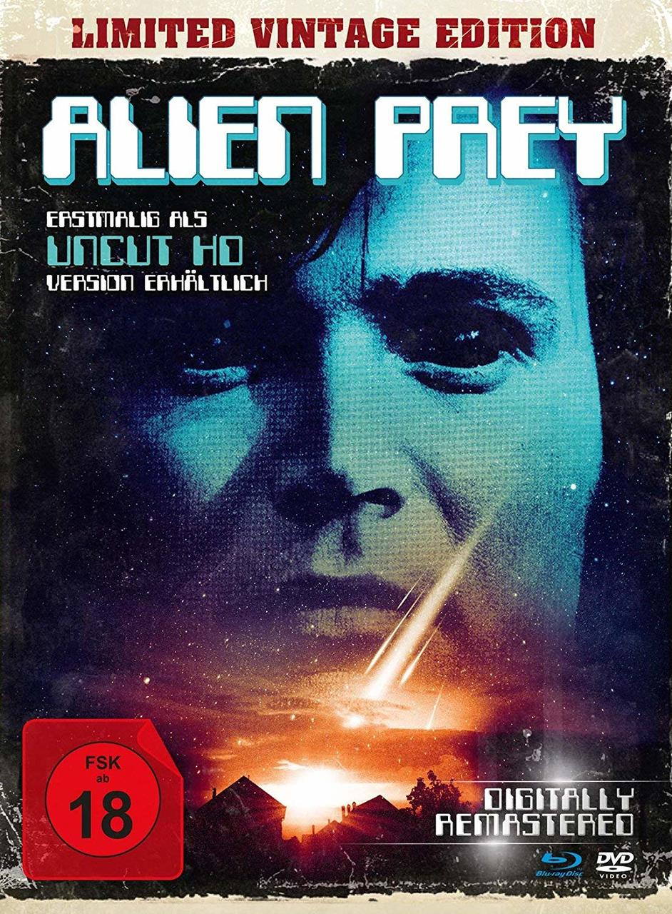 DVD-Cover von "Alien Prey" mit Gesicht im Hintergrund und Text.