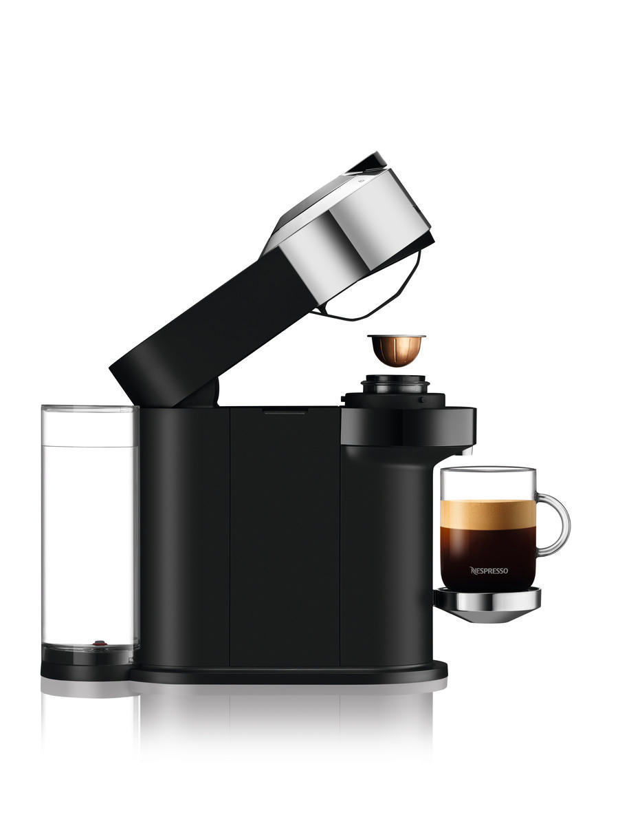 Eine schwarze Nespresso-Maschine mit einer Kaffeetasse und einer Kapsel.