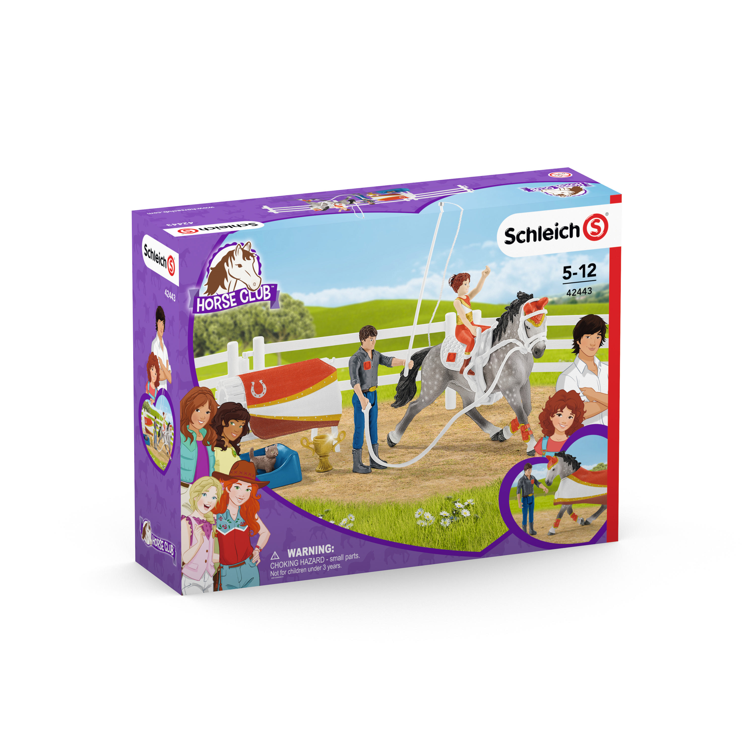 Ein Pferdespielzeug in einer Box mit einem Mädchen und einem Pferd.