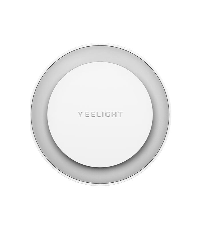 Beyaz, yuvarlak Yeelight akıllı lamba. Marka adıyla beyaz dairesel bir tasarıma sahip.