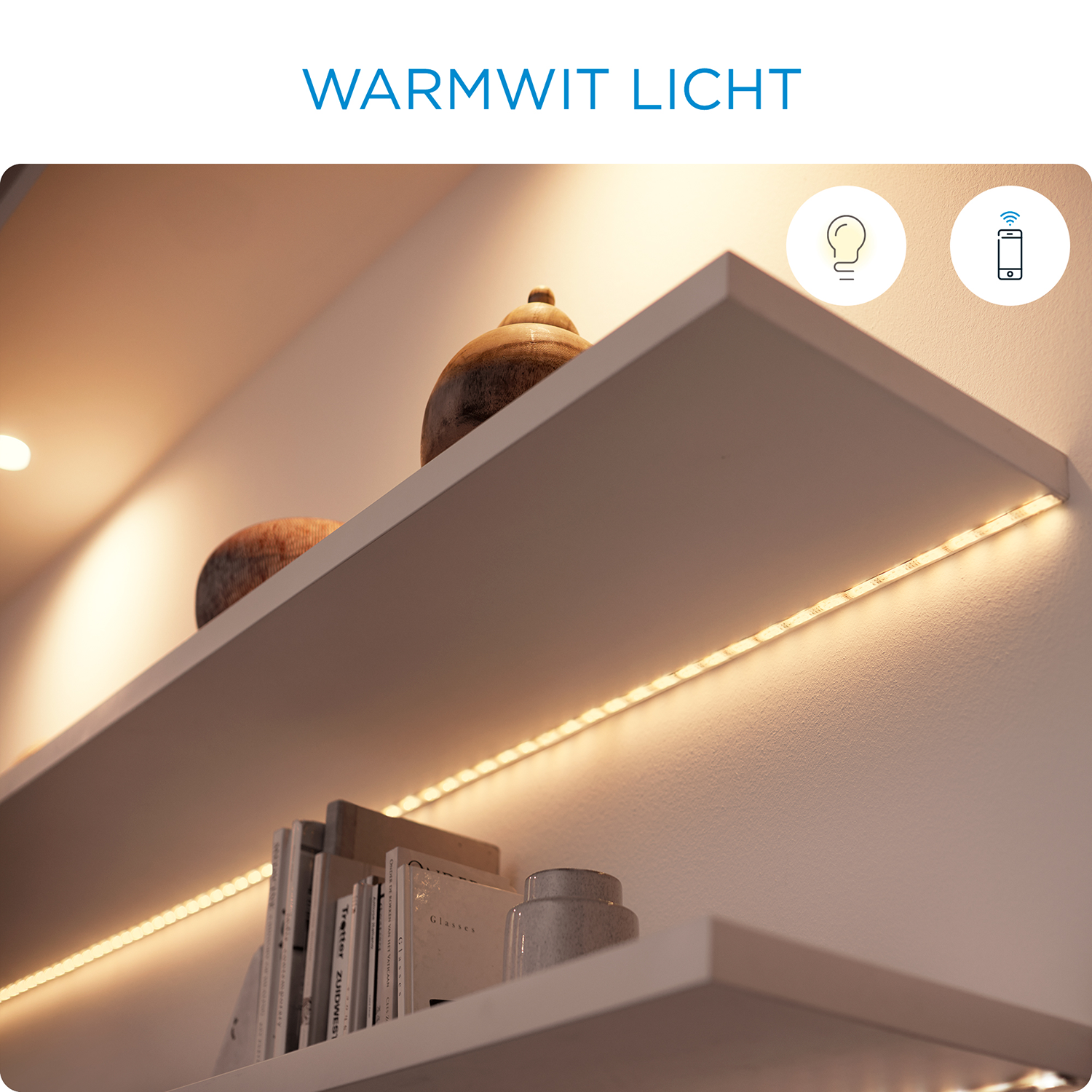 Shelves with lighting. Books, a vase, and a pot are on the shelves.