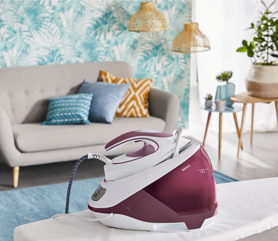 Tefal Express compact steam generator iron on ironing board.