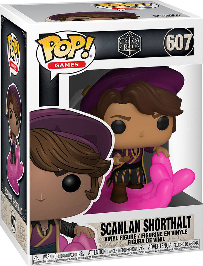 Figurine Funko Pop dans une boîte. Un personnage avec un chapeau violet tient un objet doré.