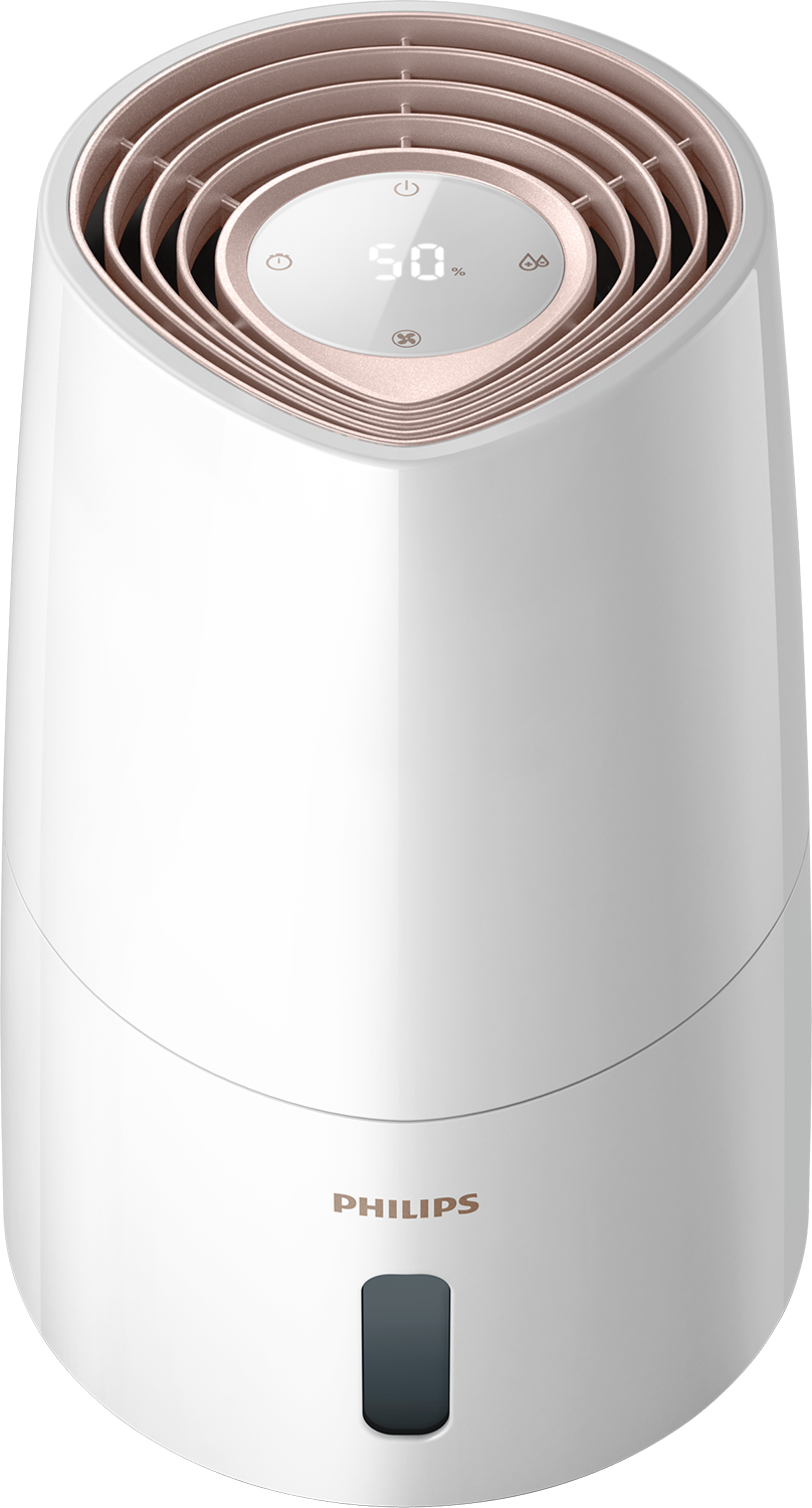White and rose-gold air humidifier. The display shows 50%. Philips logo is visible.