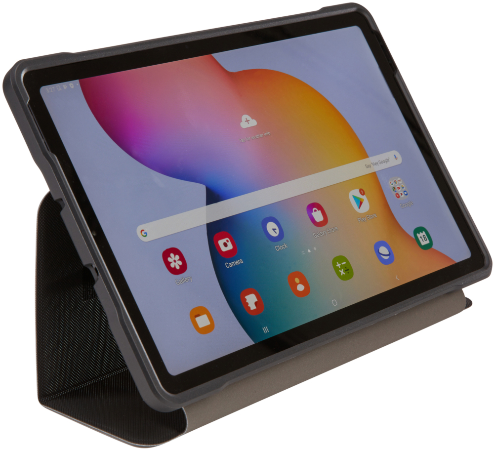 A tablet in a case is displayed on a white surface. The screen shows the app icons.