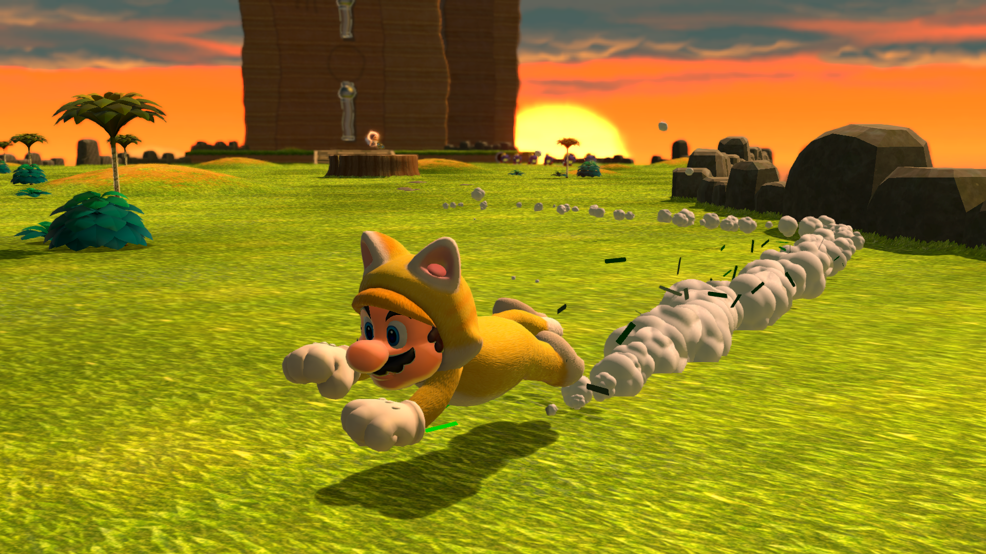 Mario in un costume da gatto che corre attraverso un campo erboso verso un castello al tramonto.