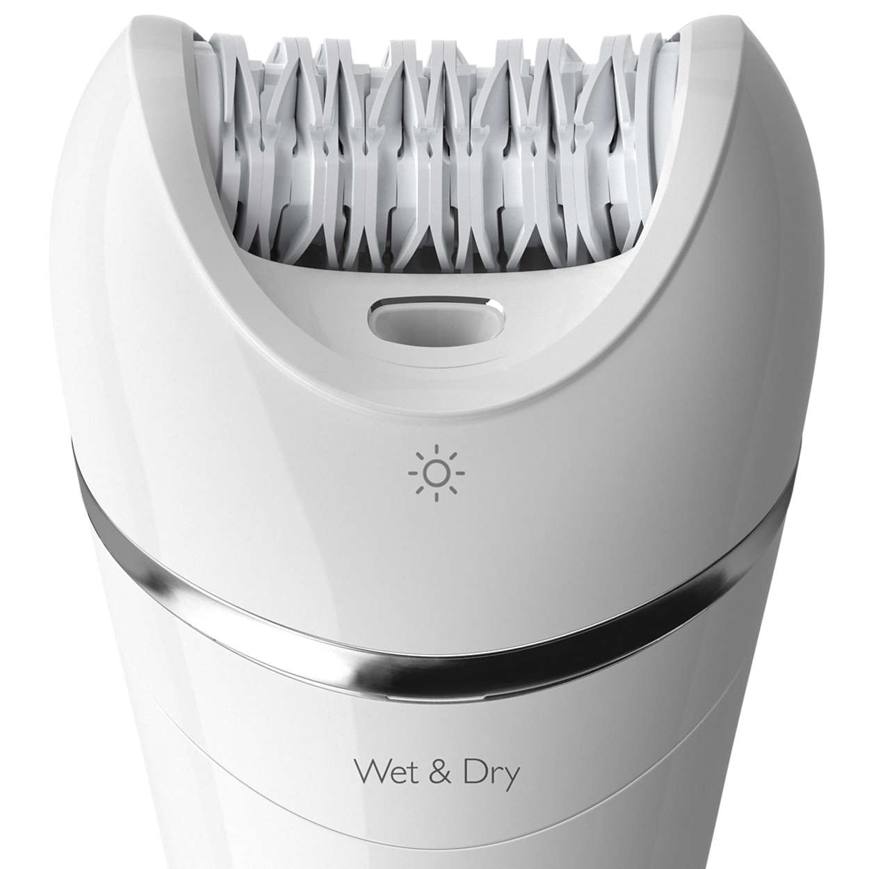White epilator with a silver trim and the words "Wet & Dry". Close-up view.