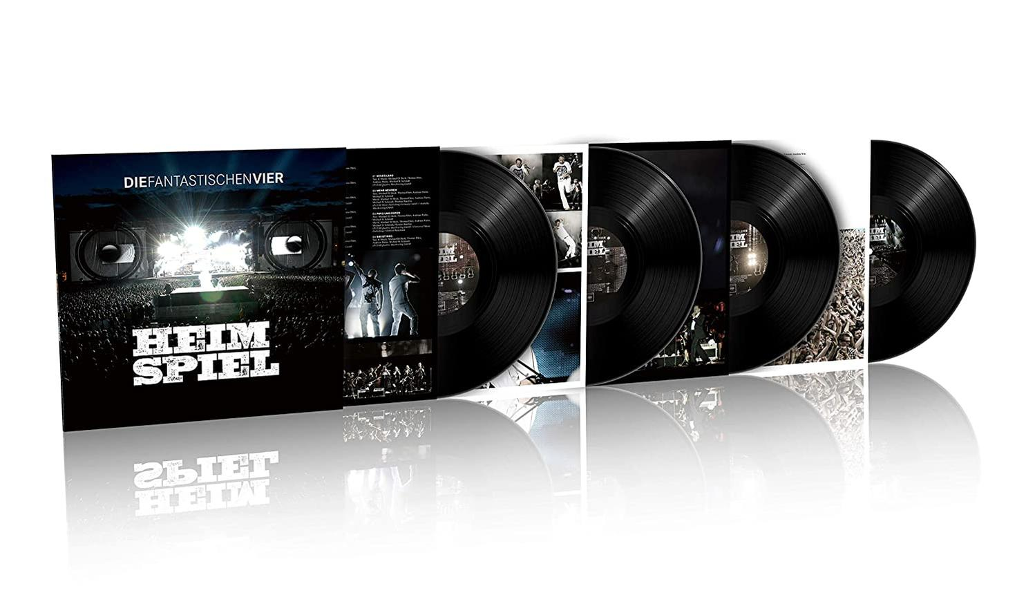 Vinylplatten in Hüllen, Album 'HEIMSPIEL'. Schwarze Platten mit Cover-Art vor weißem Hintergrund.