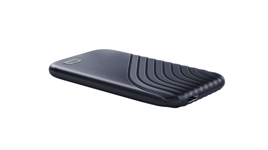 Black external hard drive with a textured top. The drive is on a black background.