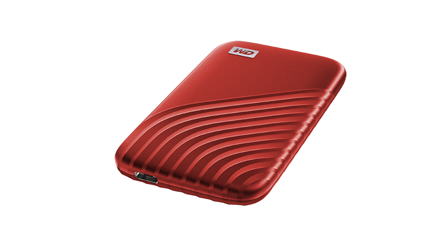 A red WD My Passport portable hard drive on a black background.