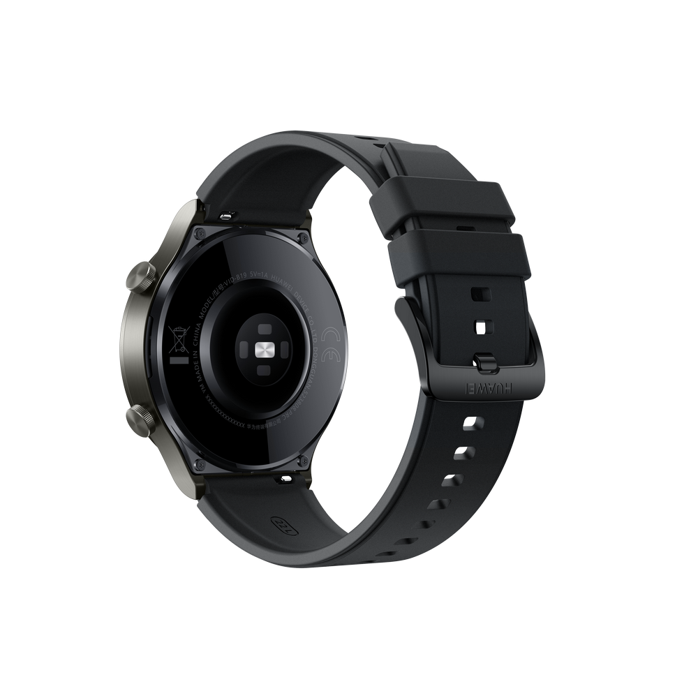 La parte trasera de un smartwatch Huawei negro con correa negra, sensores y área de carga visibles.