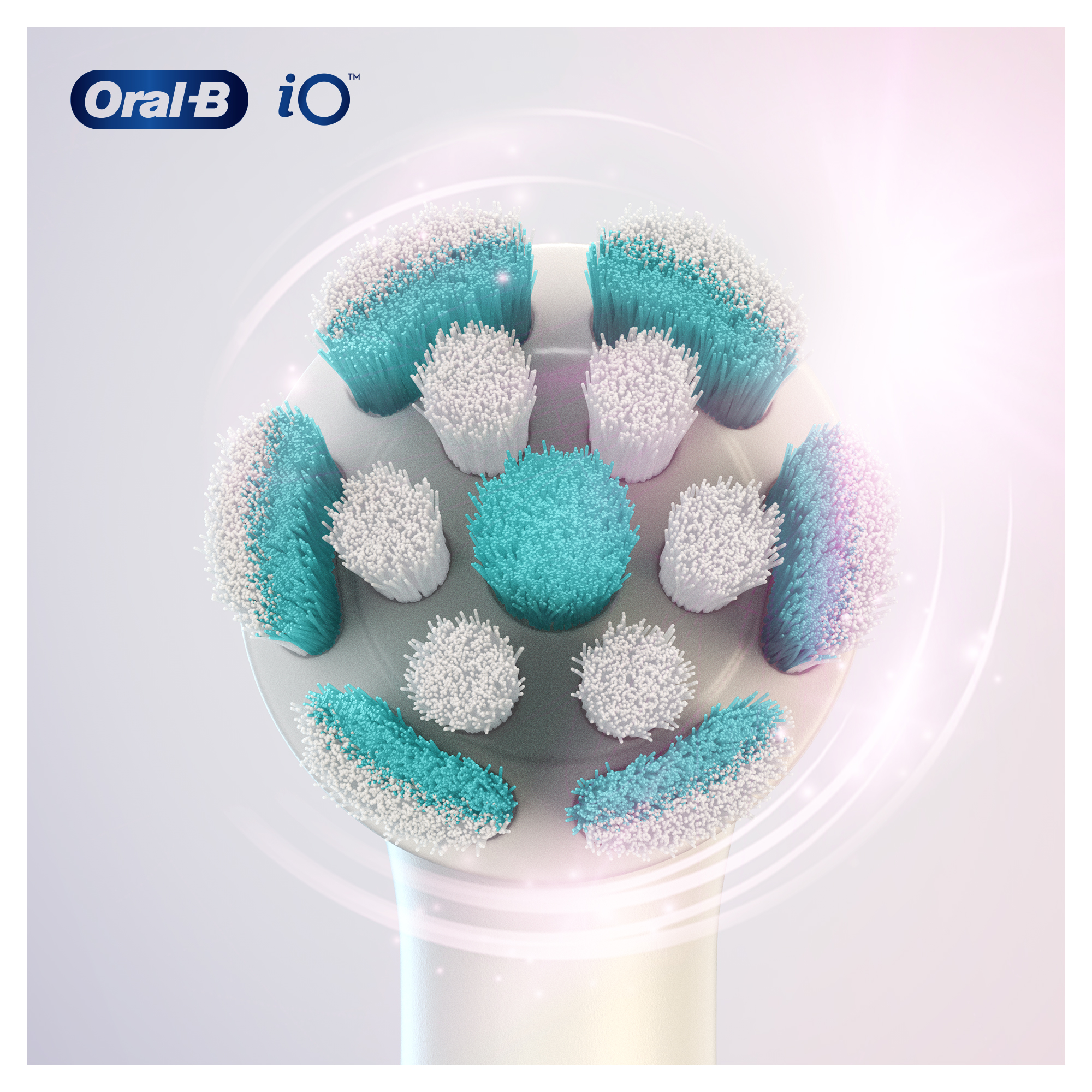 Tête de brosse à dents Oral-B iO. Soies turquoise et blanches, forme ovale, base blanche, logo.