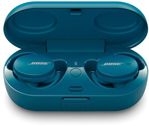 Une paire d'écouteurs Bose bleu sarcelle dans un étui de chargement ouvert avec symbole Bluetooth.