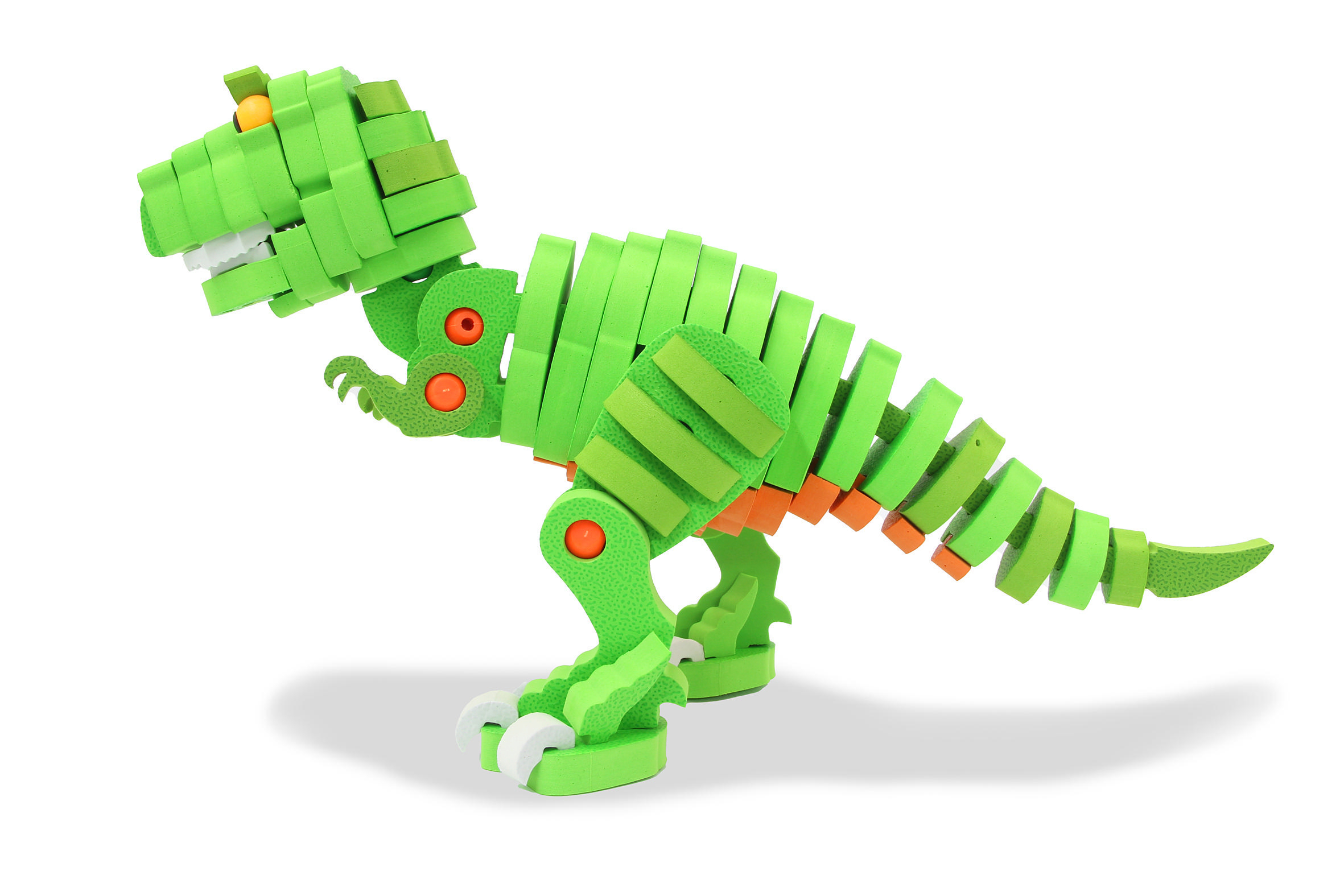 Ein grünes Dinosaurierspielzeug aus Schaumstoffblöcken. Orange Akzente.