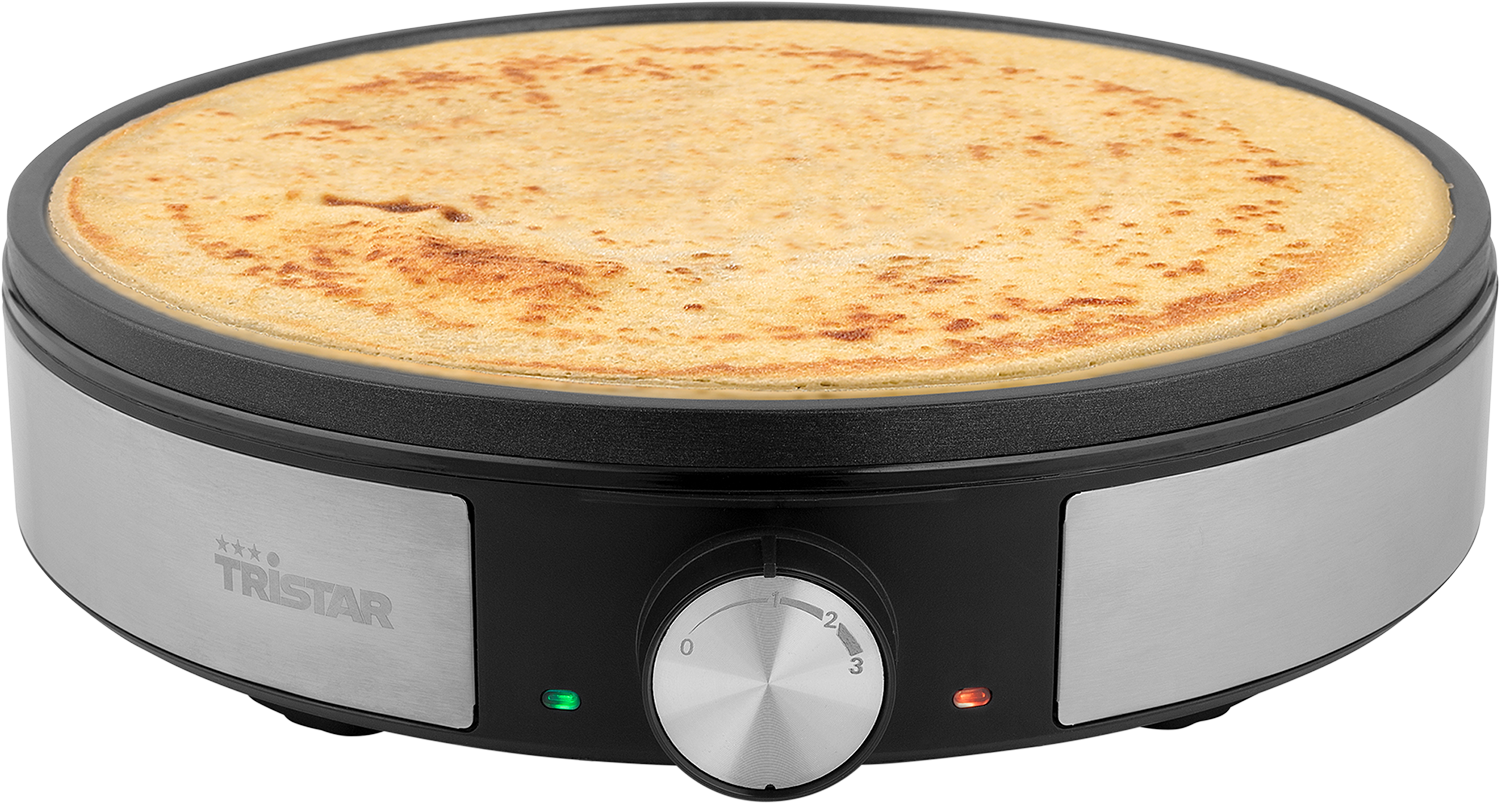 Crepe maker. A round black and silver appliance with a cooked crepe inside.