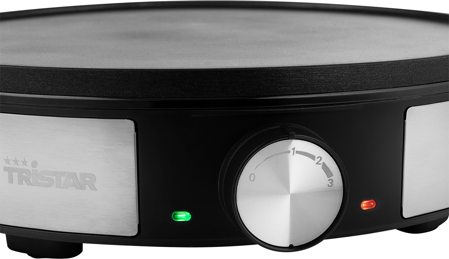 Crepe maker with black surface. It has a dial with numbers from 0 to 3, and lights.