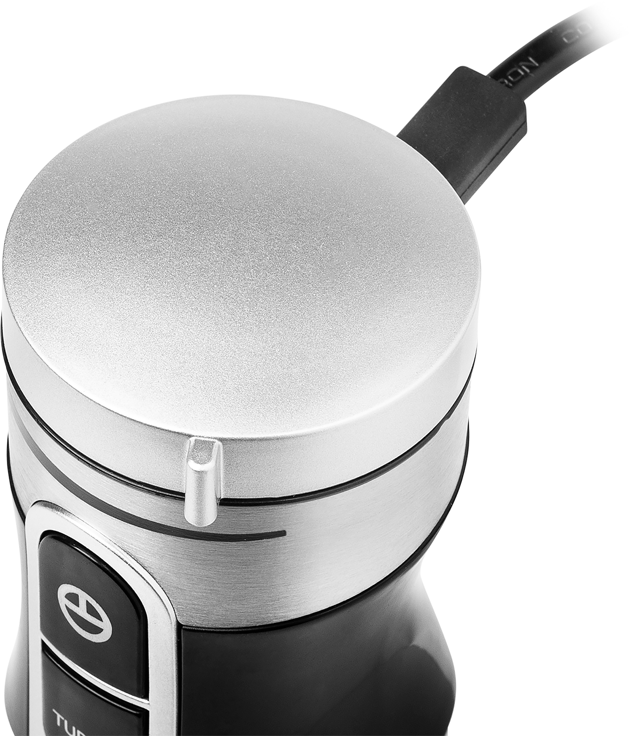 Hand blender detail. Silver top with a dial and a button. Black base with a power cord.