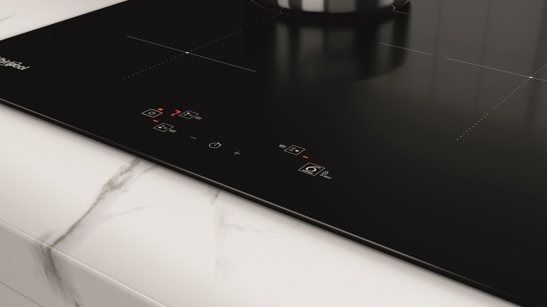 Primer plano de placa de inducción negra con controles digitales.