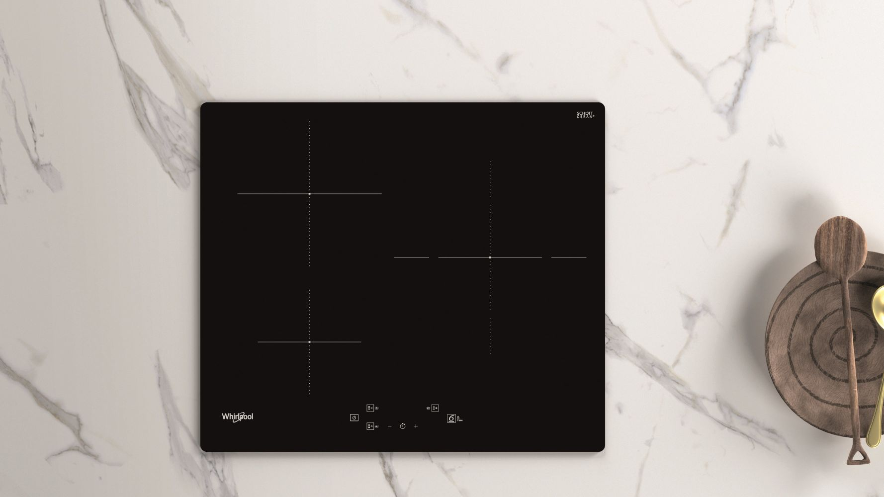Una placa de inducción Whirlpool negra con tres quemadores. Cucharas de madera a la derecha sobre mármol.