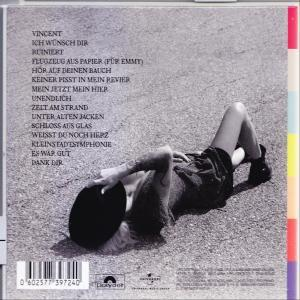 Albumcover, Schwarzweißfoto einer Frau, die auf dem Boden liegt und eine Scheibe hält.