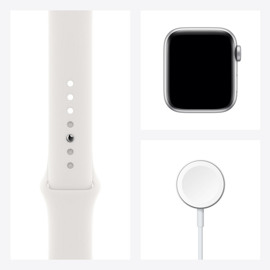 Apple Watch blanca, correa y cargador, sobre fondo blanco.