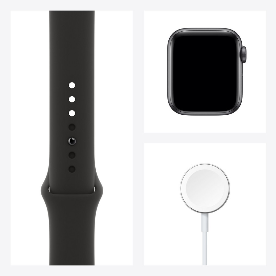 Correa, esfera y cargador de Apple Watch negros. Todo sobre un fondo blanco.