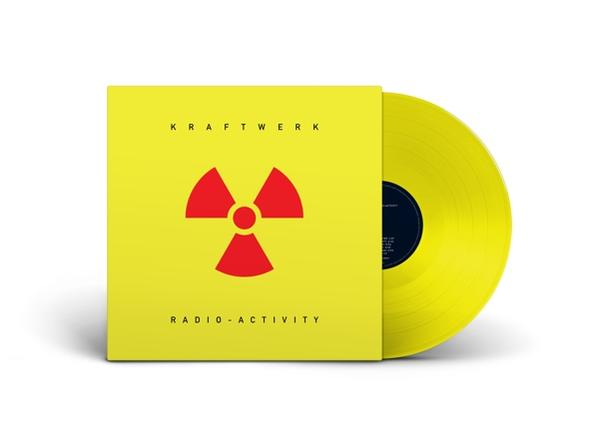 Kraftwerk-Album 'Radio-Activity', gelbes Cover mit rotem Strahlungssymbol und die gelbe Vinyl.