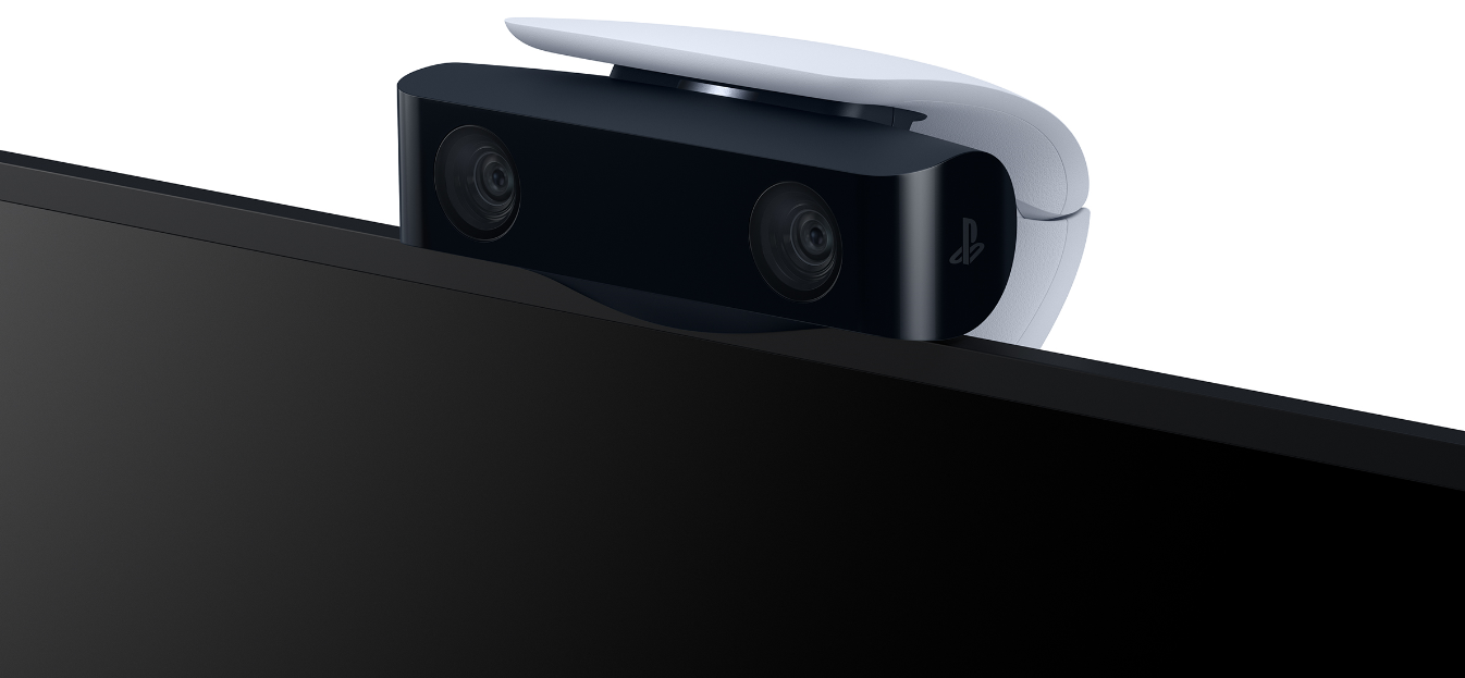 Una cámara PS5 en blanco y negro con dos lentes, montada en un televisor.